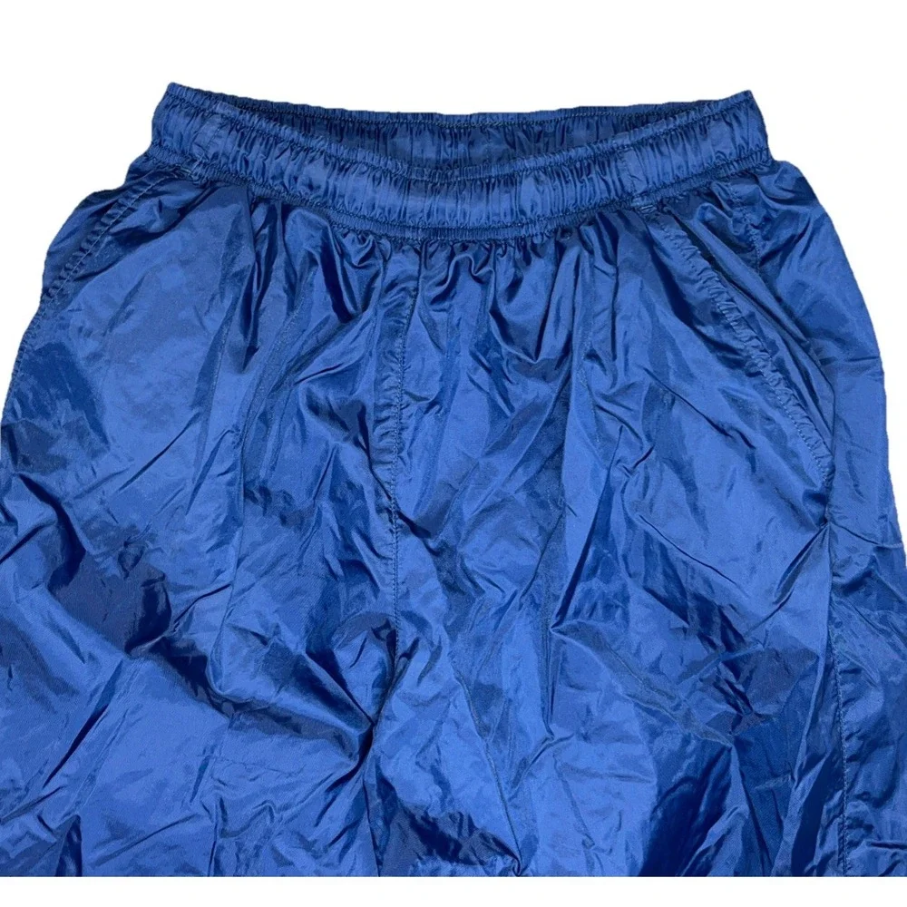 Vintage Nike Youth M (8-10) Blue Nylon Track Pants Zip Ankle Cinch Waist Retro